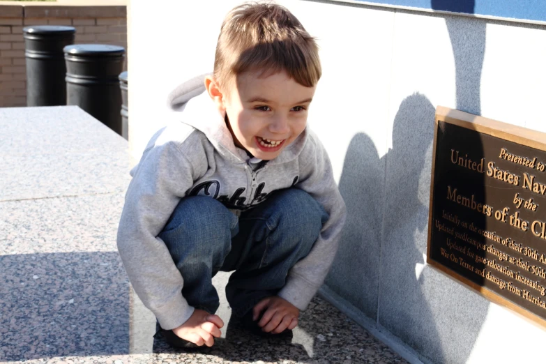  sitting on the corner of a wall