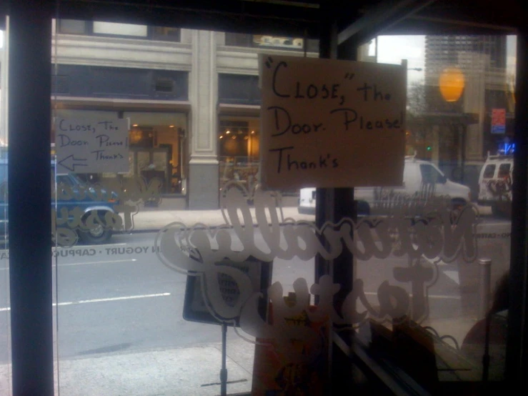 an advertit in the window that is written on