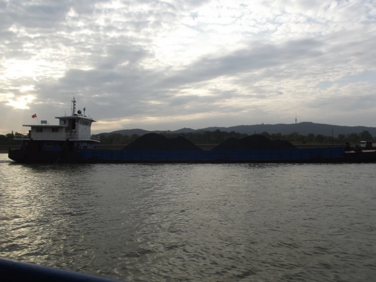 a large ship floating on top of a river