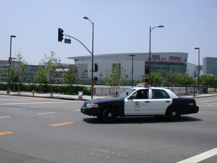 a police car that is parked at an intersection