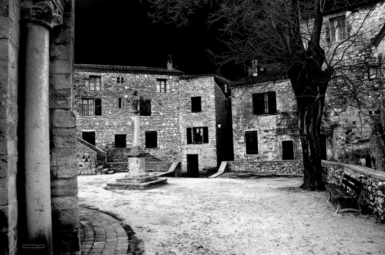 an old castle like building lit up at night