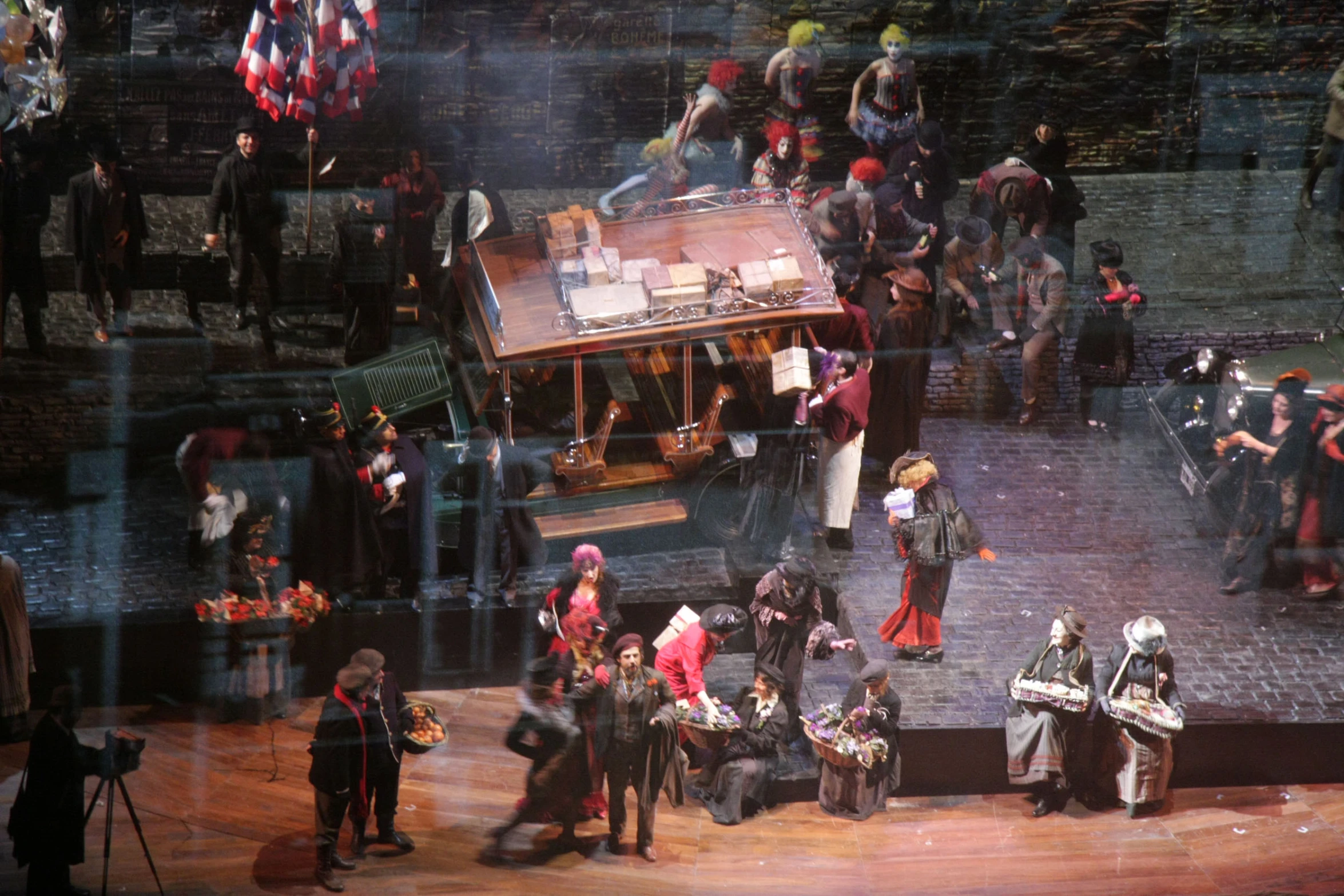 people gathered around the stage for an opera show