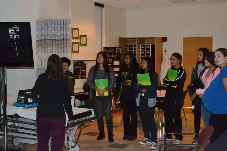 a group of people standing in a room