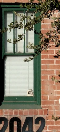 a window and sign on a building