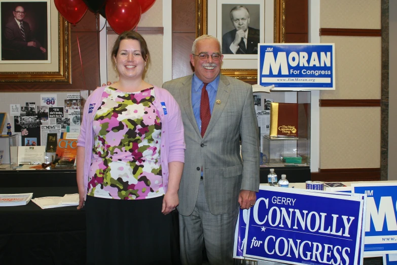 two people posing for a po at a campaign