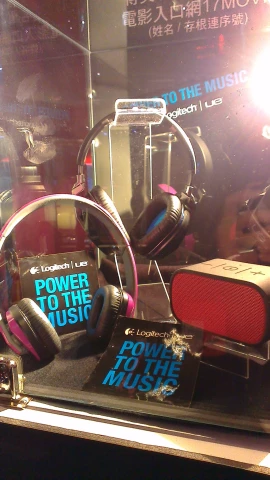 headphones and other accessories displayed in a display