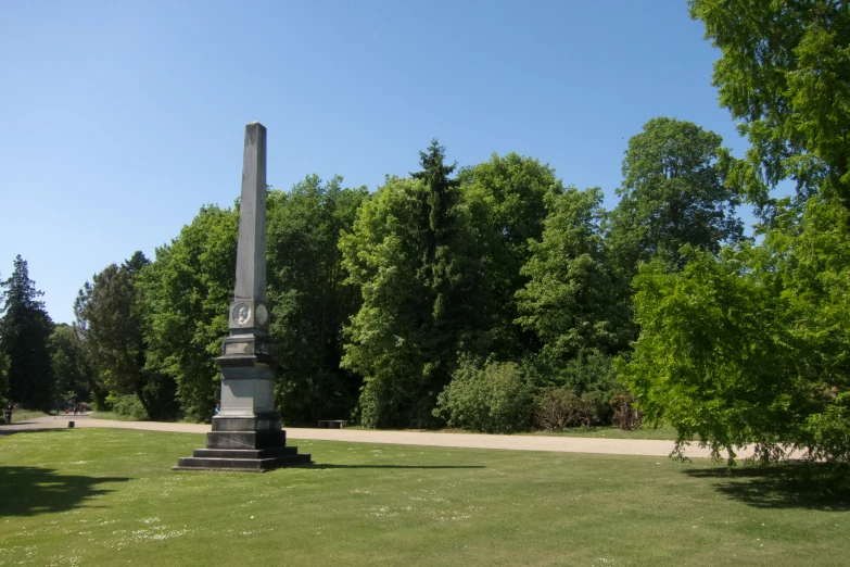 a large monument on the ground in a park