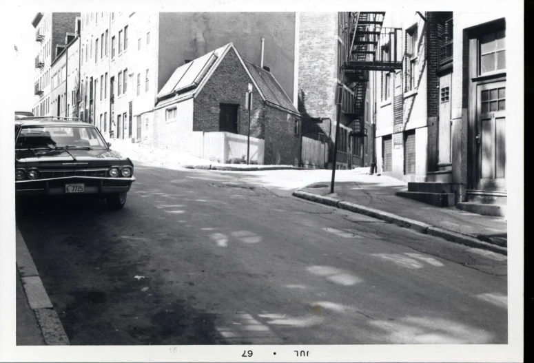 an old black and white po of an empty street