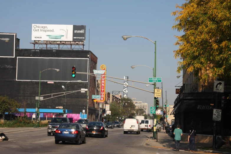 a view down the street where cars are parked