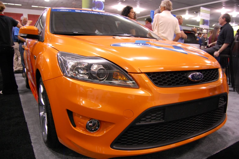 a car that is on display at a show