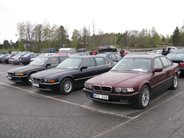 a parking lot with several vehicles parked in it