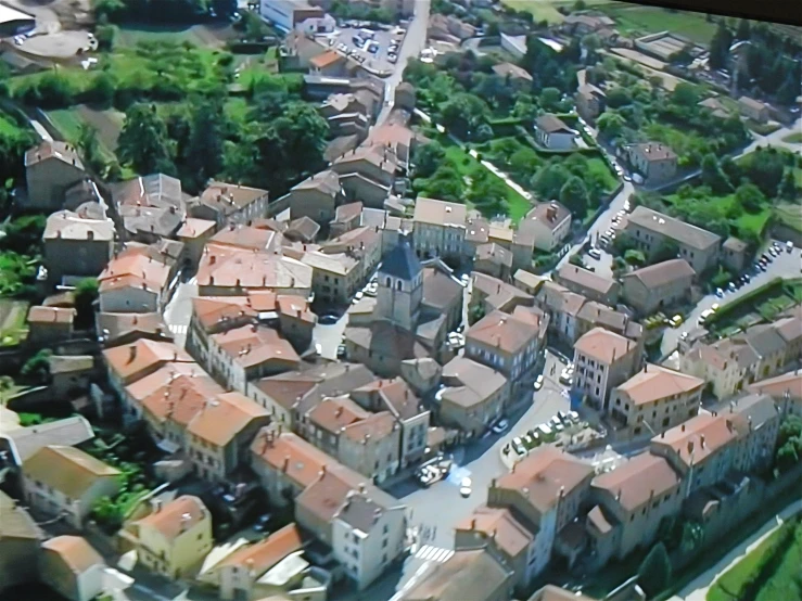 this is an aerial po of a town with many houses