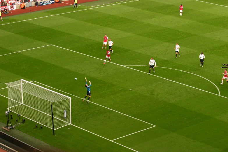 several players are playing soccer on a field