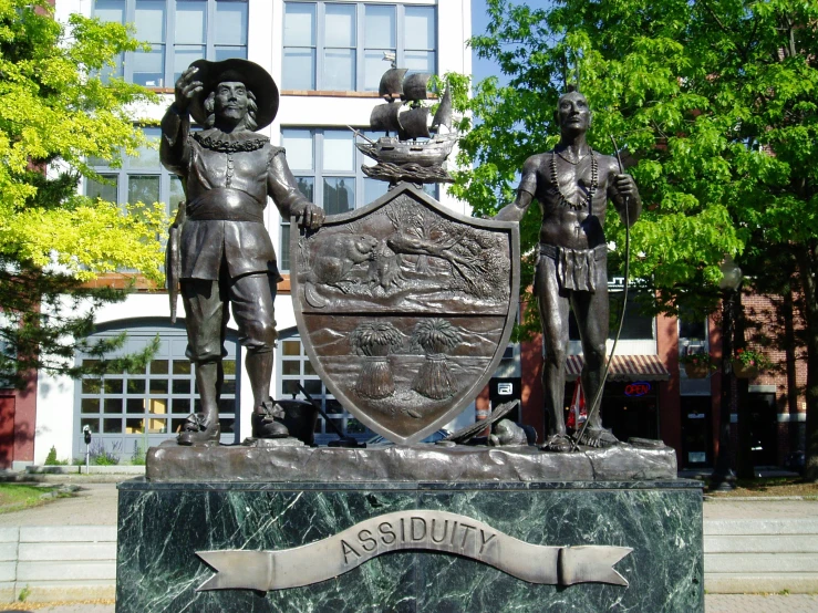 the statue is located outside of the building