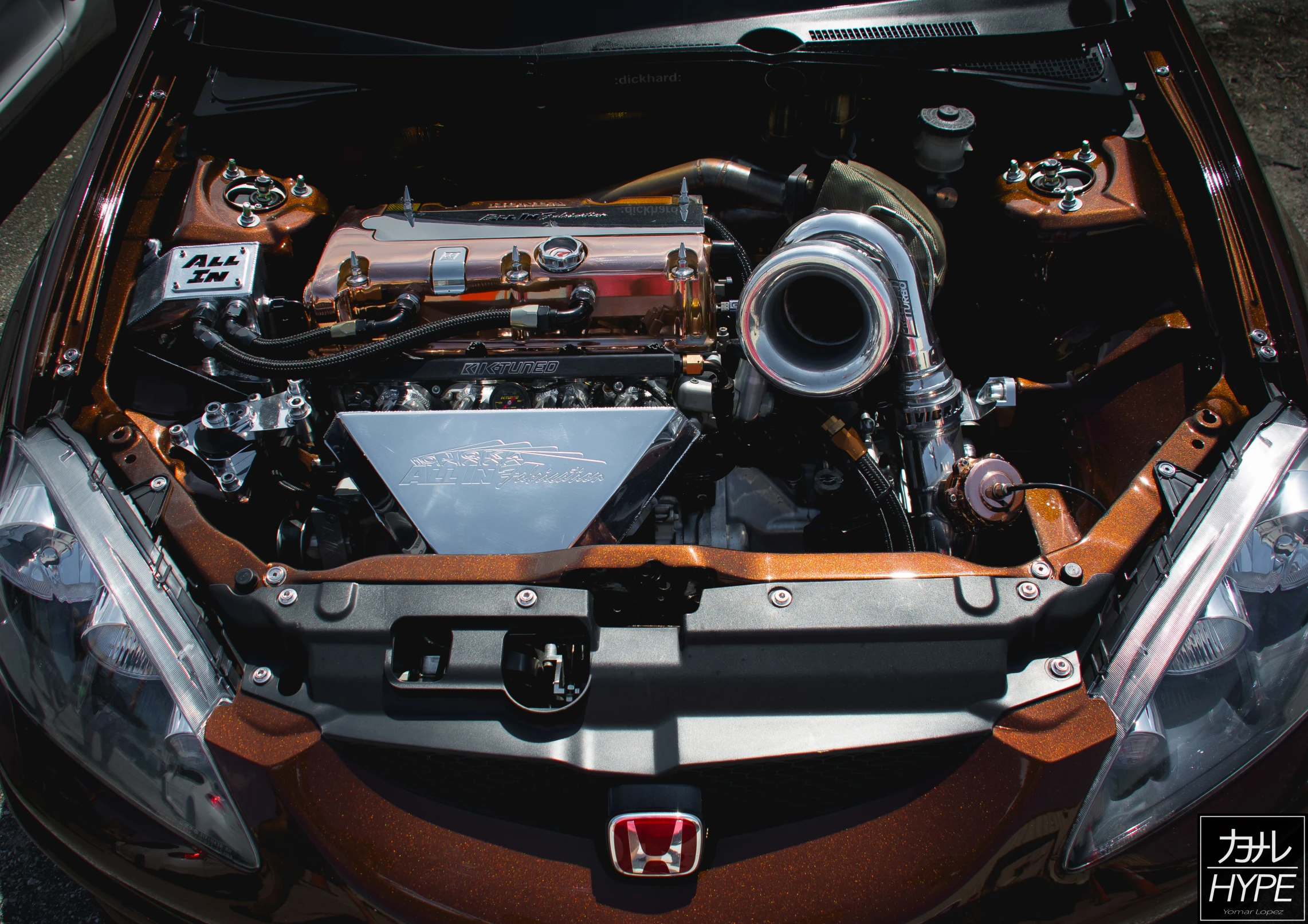 an engine compartment of a car showing the power and features