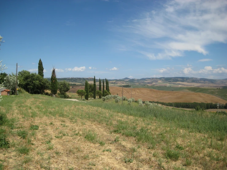 there is a hill in the middle of a large field