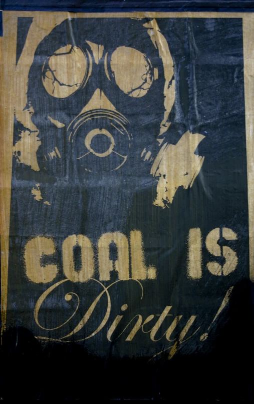 poster with a gas mask and the words coal is dirty