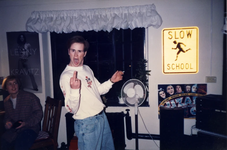 an image of a boy posing with his fans