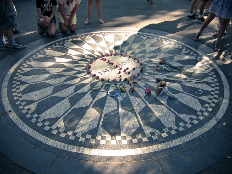 this is an outdoor decoration consisting of flowers and the words love spelled out in white