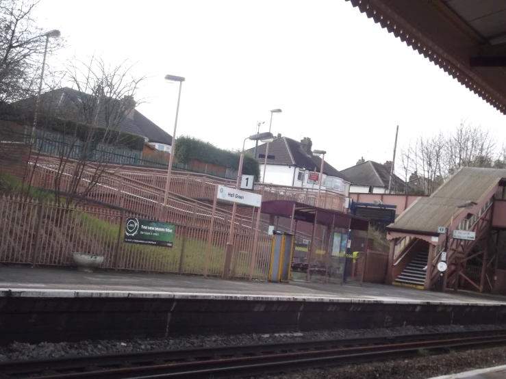there is a train station next to the tracks