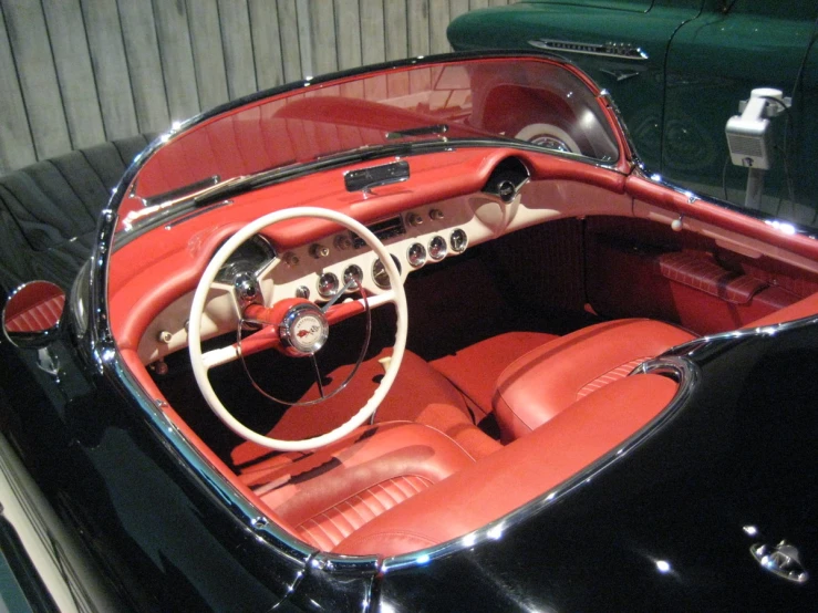 an interior view of a classic car from the fifties