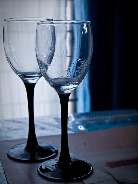 a couple of glasses sitting next to each other