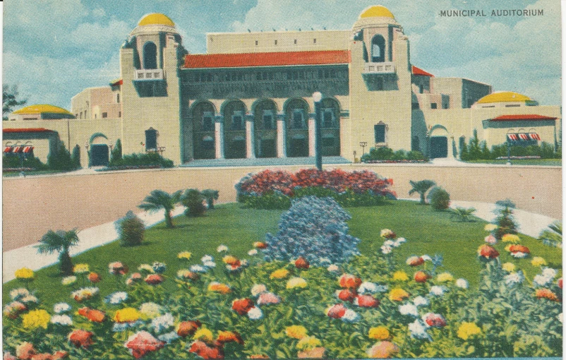 a painting of an old building with flowers in front