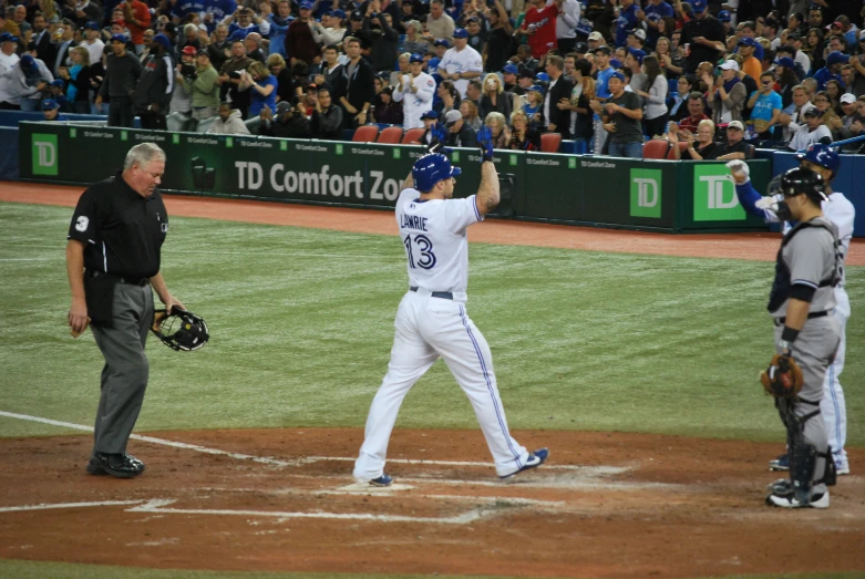 a baseball player getting ready to swing a bat