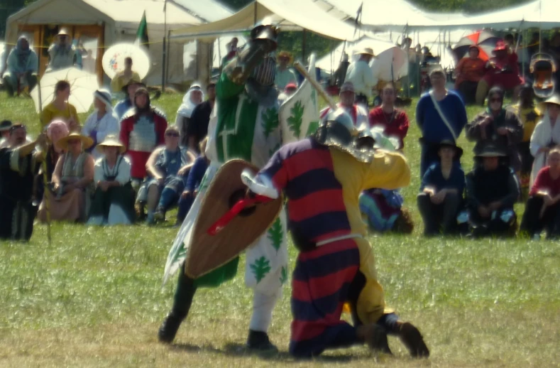 two people in knight costume standing near each other