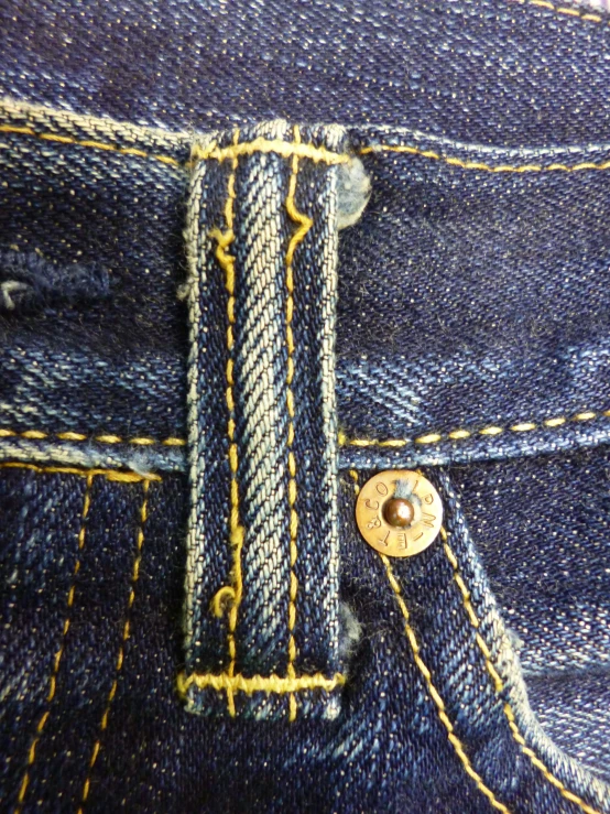 a close up view of a jeans pocket