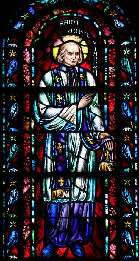a stained glass depicting st peter