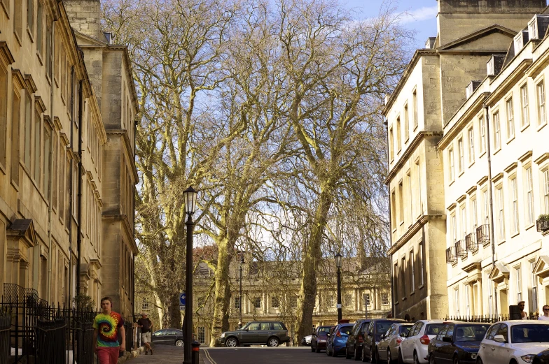 a city street with some cars parked on it