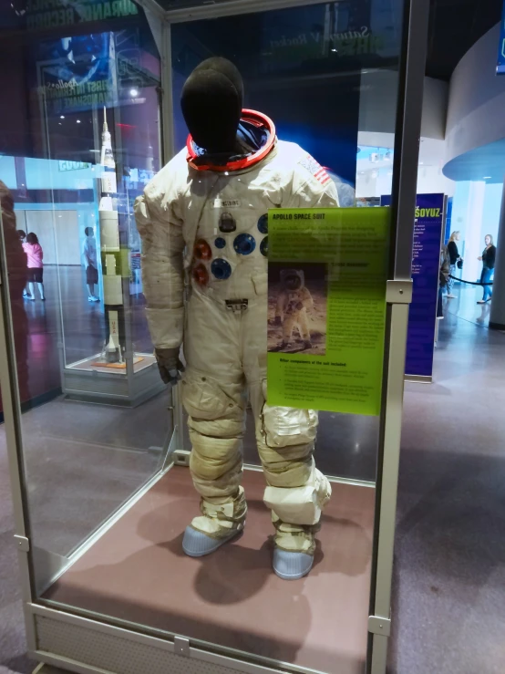 a mannequin dressed in an astronaut's outfit on display