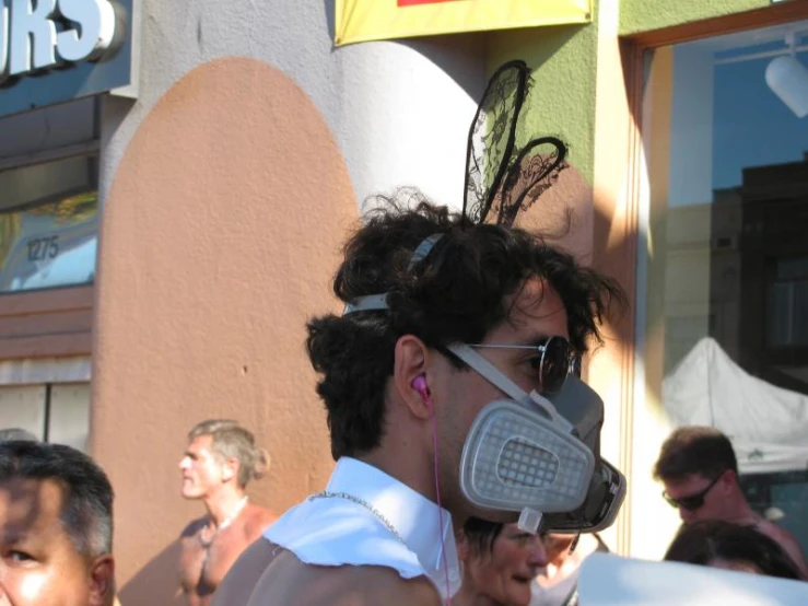 a guy in a gas mask has his sunglasses on