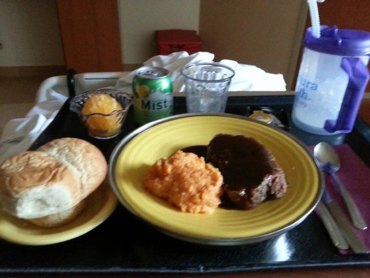 some different kinds of food sitting on a tray