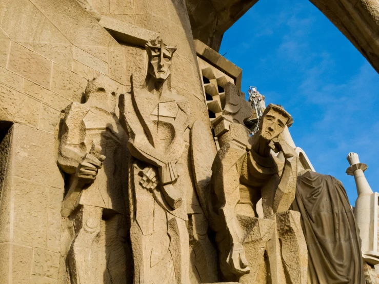 statue depicting saints, saints on a cross and a saint - in - arms