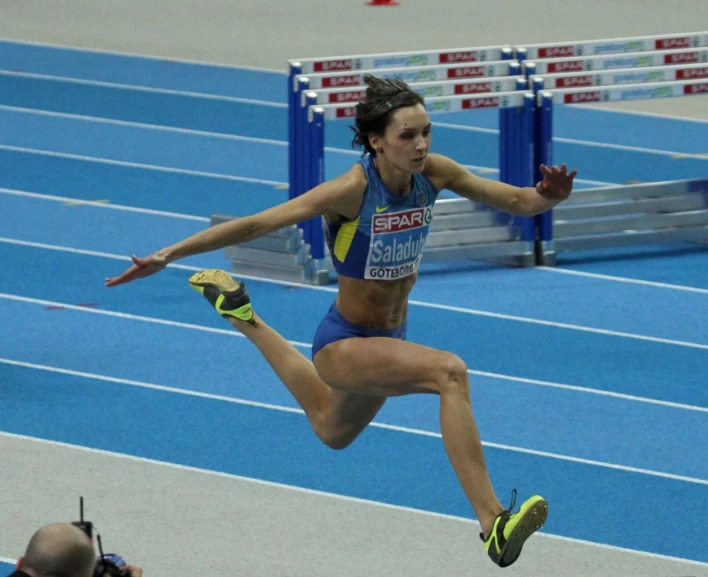 a women who is jumping up in the air