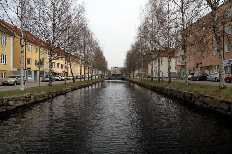 a waterway in the center of a small town