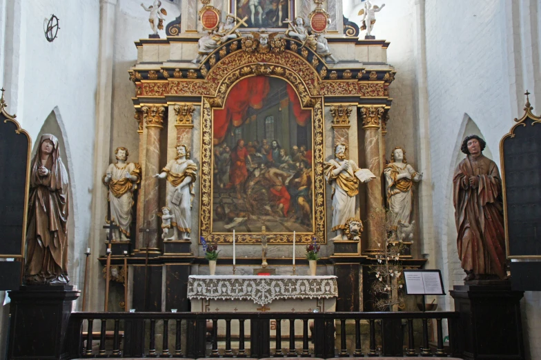 an ornate altar with gilded decorations in front