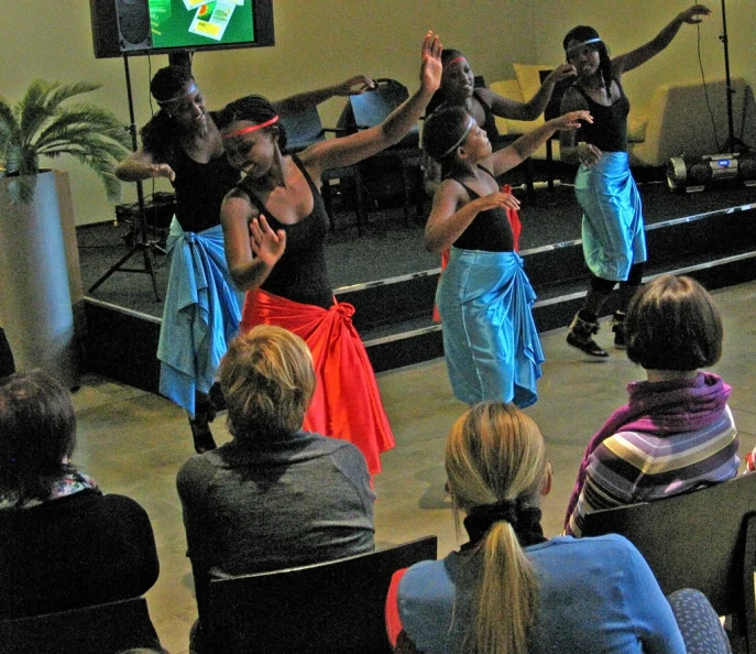 an event is taking place with women doing soing