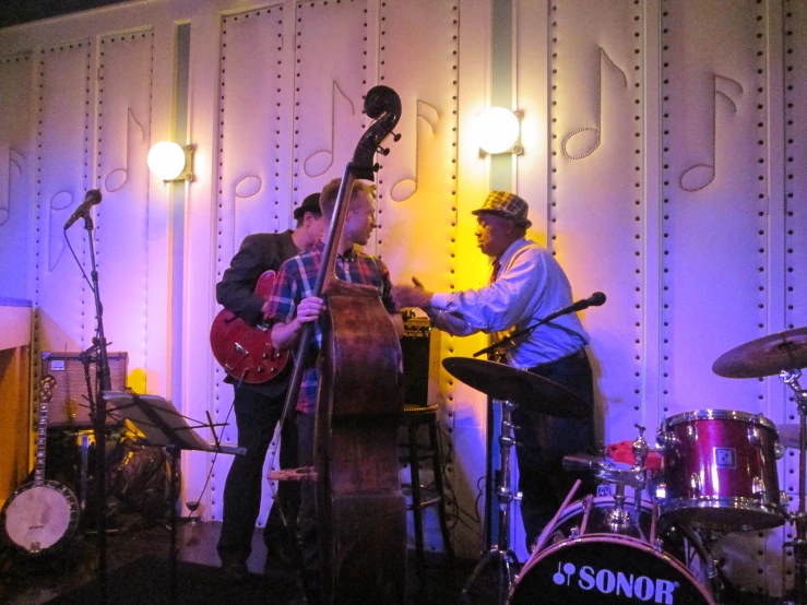 a band playing live music in a bar