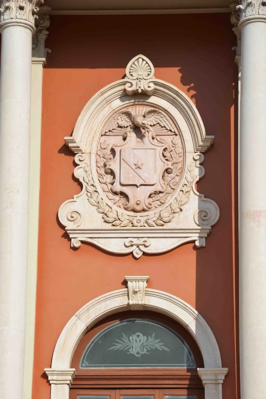 the front view of a building with a clock