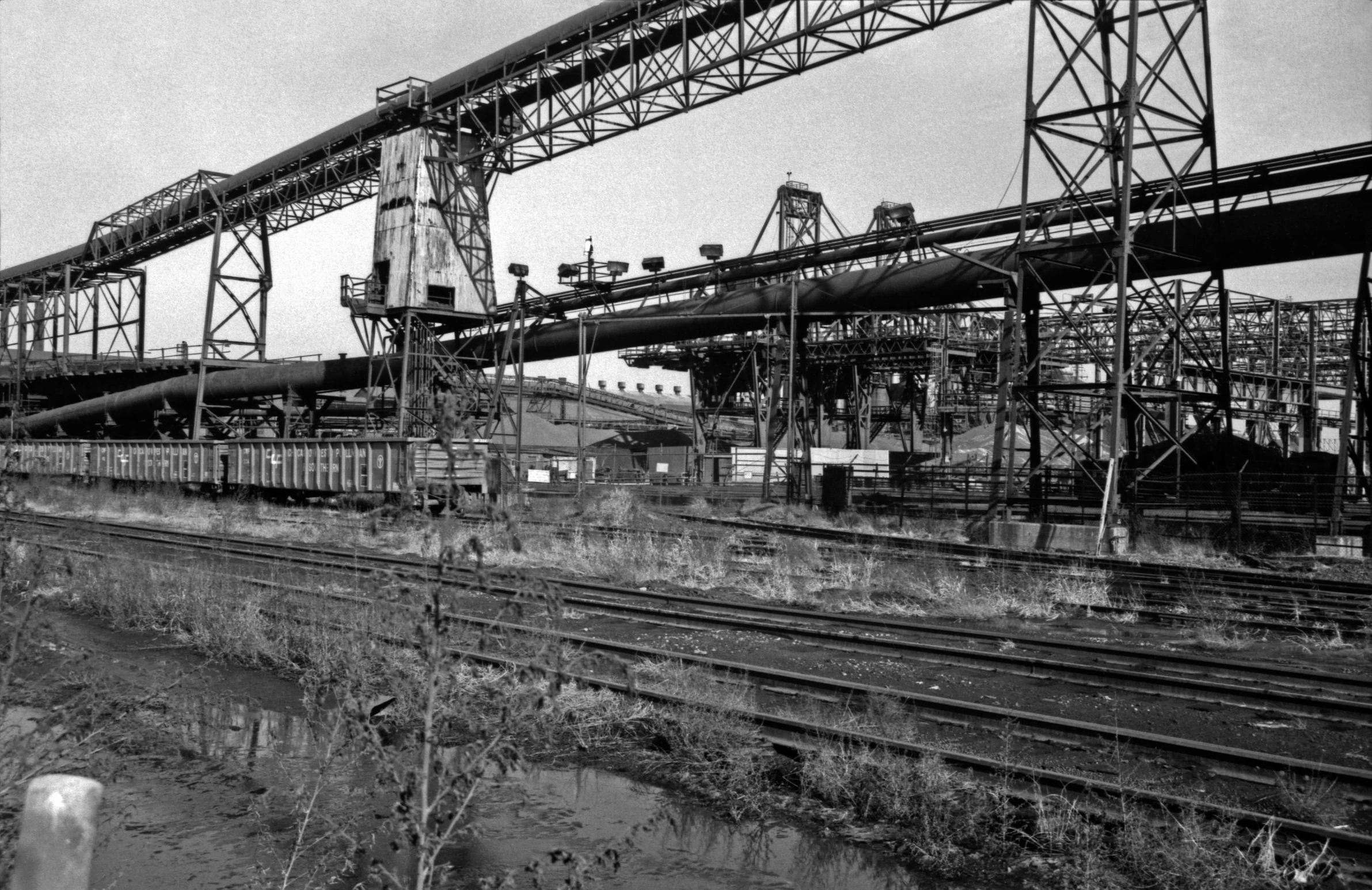 an old picture with many metal structures