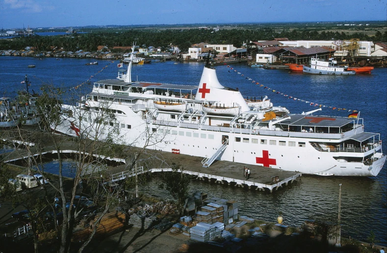 this is a large hospital boat docked in a harbor