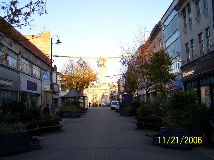 a view down an alley between two buildings