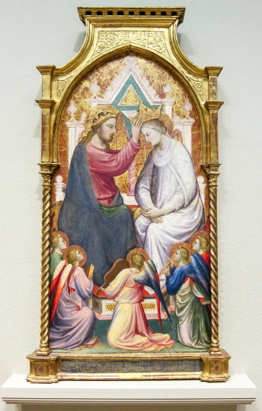 an art work of a religious icon with a woman holding the hand of an infant