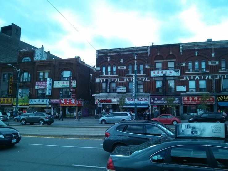 a city with lots of cars parked on the street