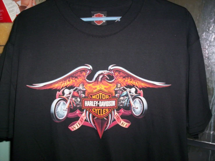 a harley davidson shirt featuring a large eagle and a motorbike