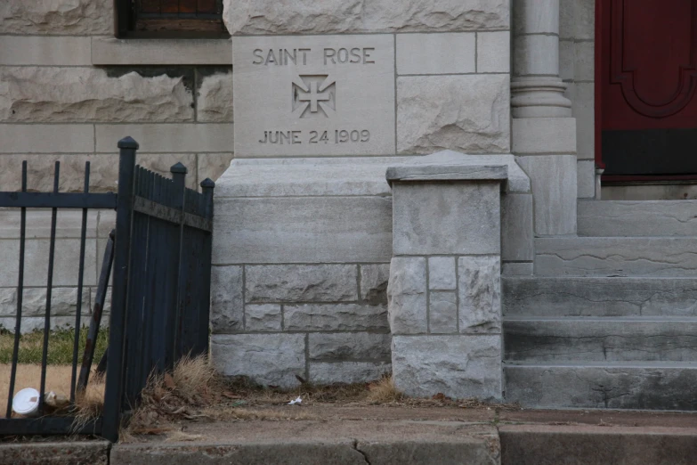 the gate is closed by the steps at the church