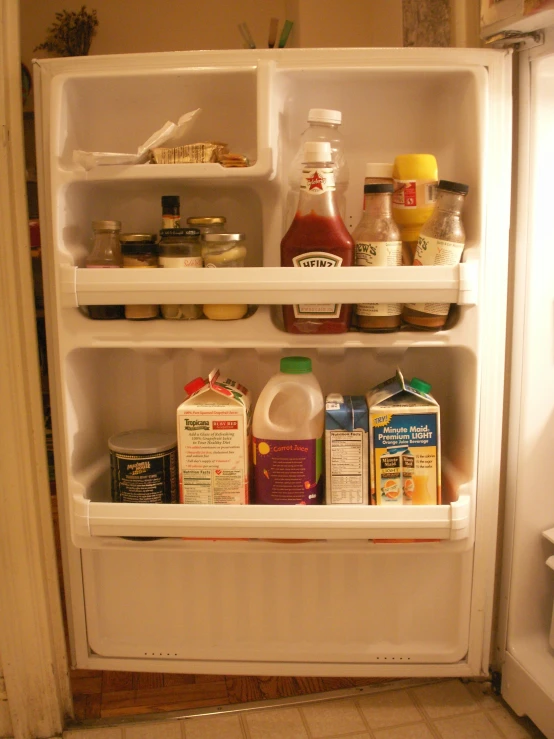there is food and drinks in the refrigerator